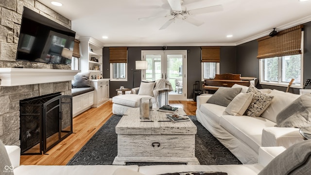 440 E 82nd St, Indianapolis, IN 46240 - living room with ornamental molding, ceiling fan, healthy amount of natural light, light wood-style flooring, and recessed lighting