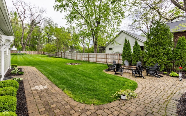 440 E 82nd St, Indianapolis, IN 46240 - view of yard with an outdoor fire pit and a patio area