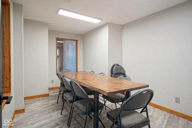 102 Clarendon Dr Unit 506, Noblesville, IN 46062 - dining space featuring baseboards and light wood-style floors