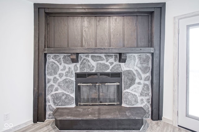 102 Clarendon Dr Unit 506, Noblesville, IN 46062 - interior details with baseboards, a fireplace, and wood finished floors