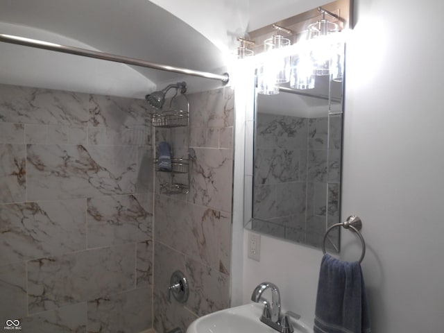 full bathroom with a sink
