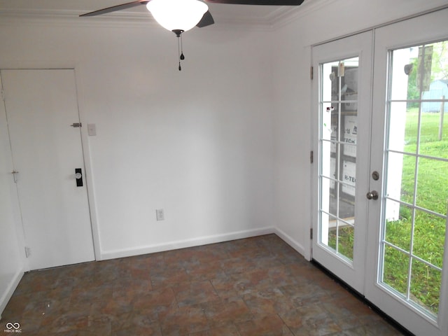 interior space featuring a healthy amount of sunlight, baseboards, ornamental molding, and ceiling fan