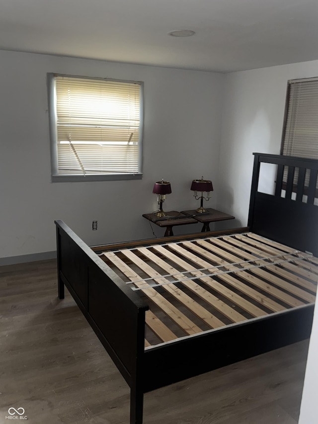 2425 S Lyons Ave, Indianapolis, IN 46241 - bedroom featuring baseboards and wood finished floors