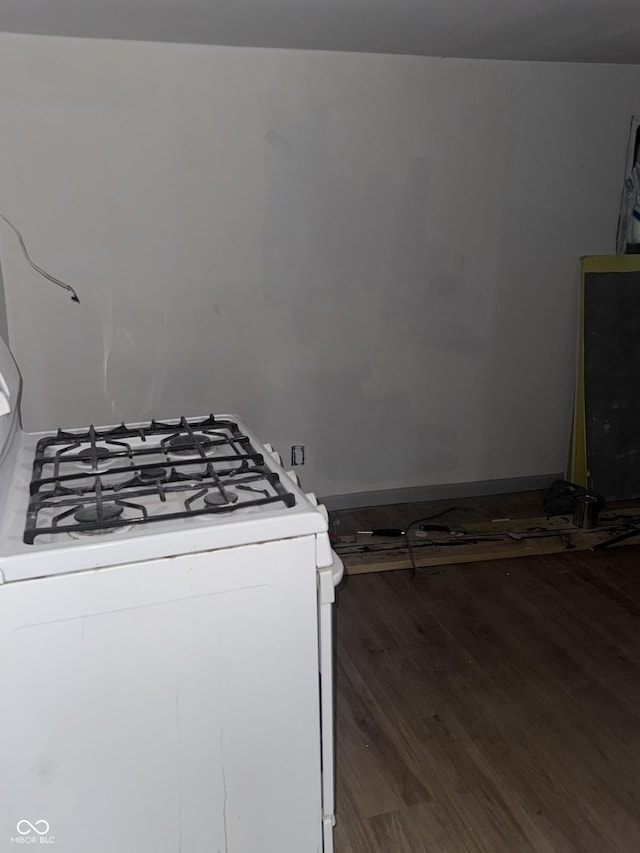 2425 S Lyons Ave, Indianapolis, IN 46241 - kitchen featuring baseboards, gas range gas stove, and wood finished floors
