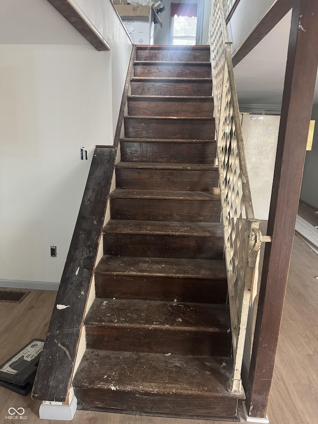 2425 S Lyons Ave, Indianapolis, IN 46241 - staircase featuring wood finished floors and visible vents