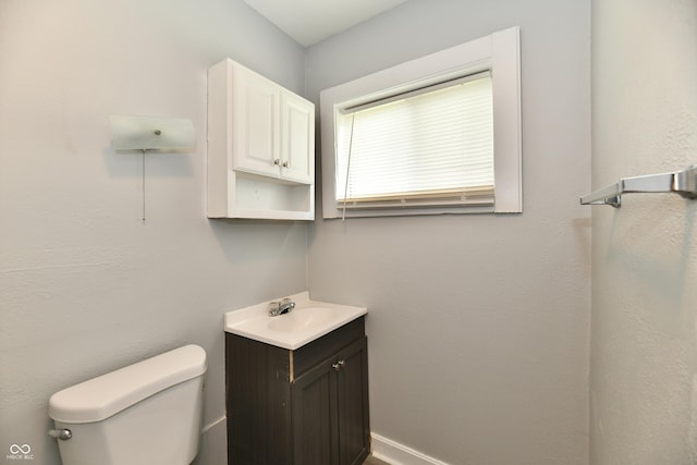 3109 Forest Manor Ave, Indianapolis, IN 46218 - half bathroom with vanity and toilet