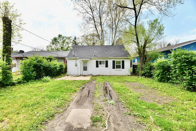 3109 Forest Manor Ave, Indianapolis, IN 46218 - rear view of house featuring fence and concrete block siding