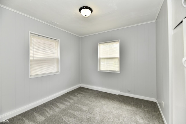 3109 Forest Manor Ave, Indianapolis, IN 46218 - carpeted empty room featuring crown molding and baseboards