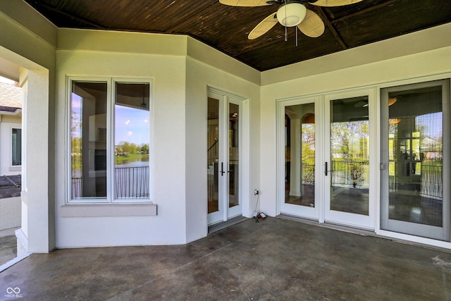 view of patio with ceiling fan and french doors