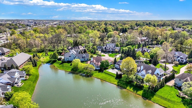 aerial view with a water view and a residential view