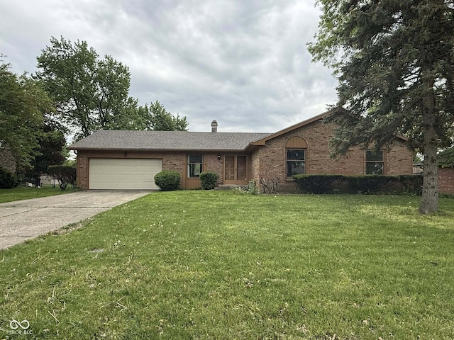 645 Boulder Rd, Indianapolis, IN 46217 - ranch-style home featuring concrete driveway, brick siding, an attached garage, and a front lawn