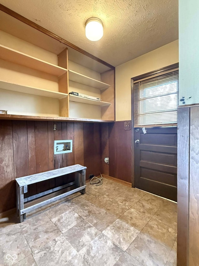 645 Boulder Rd, Indianapolis, IN 46217 - mudroom with a wainscoted wall, wood walls, and a textured ceiling