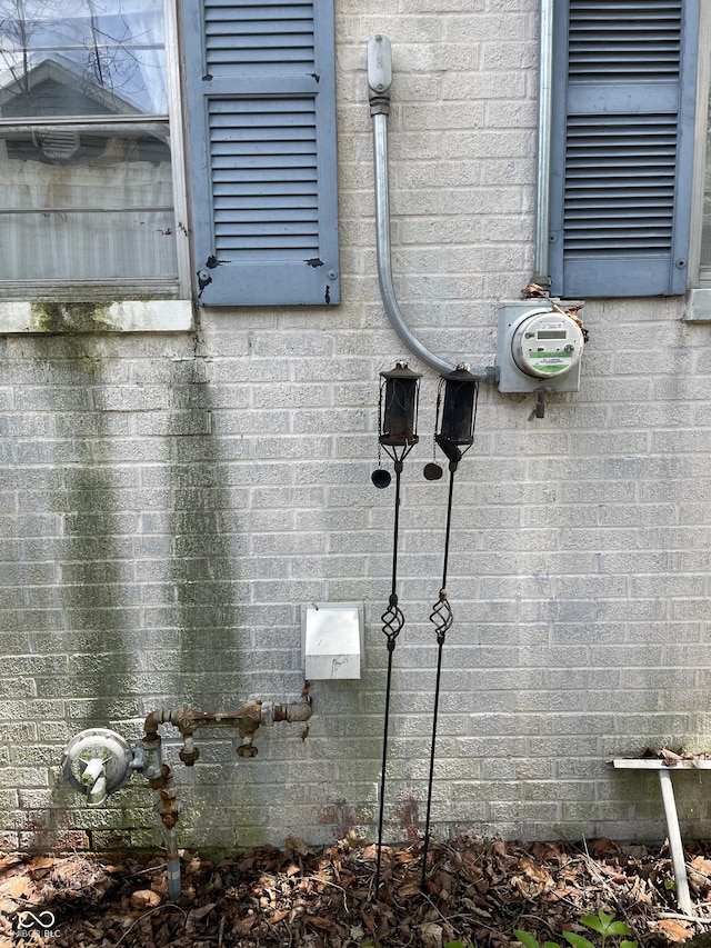 details with brick siding and electric meter