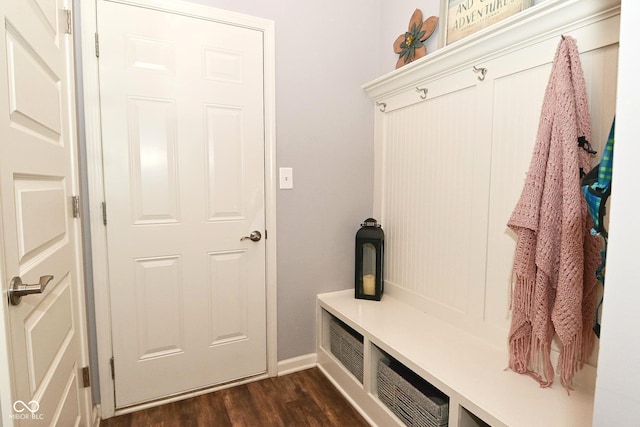mudroom with baseboards and dark wood-style flooring