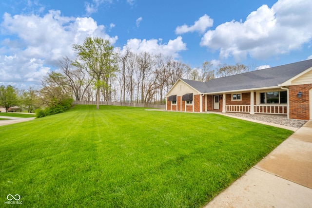 view of yard with a porch