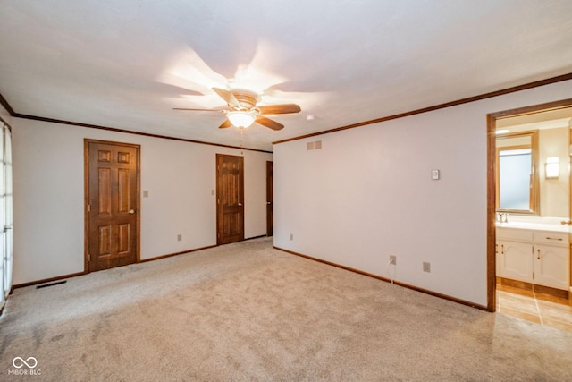 unfurnished bedroom with baseboards, visible vents, and light colored carpet