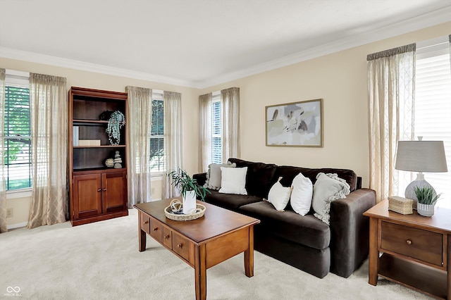 10746 Gateway Dr, Fishers, IN 46037 - living area with plenty of natural light, ornamental molding, light carpet, and baseboards