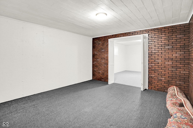 10746 Gateway Dr, Fishers, IN 46037 - unfurnished room with brick wall and carpet