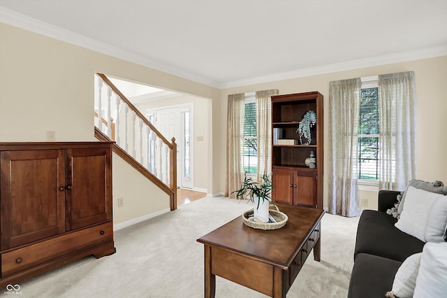 10746 Gateway Dr, Fishers, IN 46037 - living room with crown molding, light carpet, stairway, and baseboards