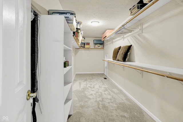 10746 Gateway Dr, Fishers, IN 46037 - spacious closet featuring carpet flooring