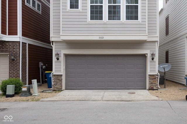 garage featuring driveway