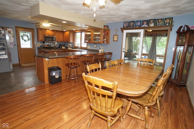 314 Olive St, Batesville, IN 47006 - dining area featuring plenty of natural light, ceiling fan, and wood finished floors