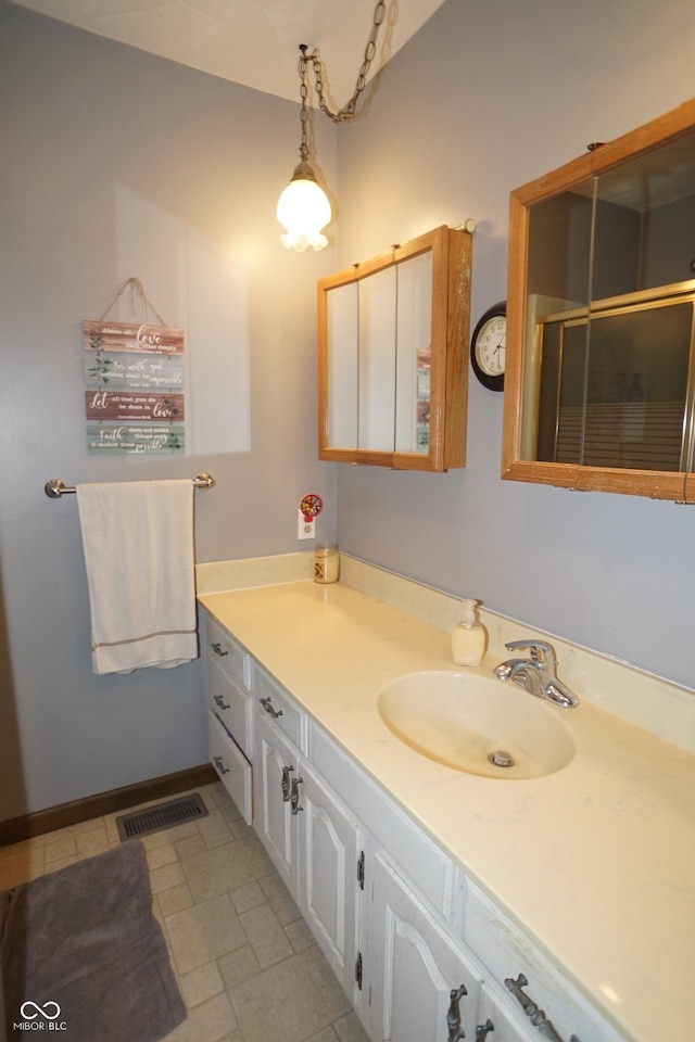 314 Olive St, Batesville, IN 47006 - bathroom with visible vents and vanity