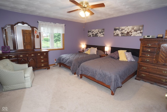 314 Olive St, Batesville, IN 47006 - bedroom featuring baseboards, ceiling fan, and light colored carpet
