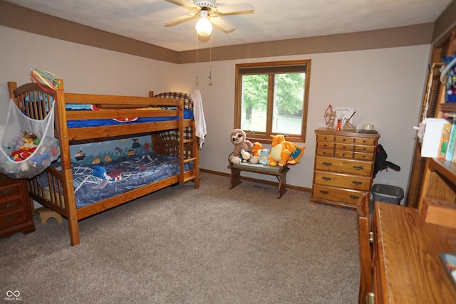 314 Olive St, Batesville, IN 47006 - carpeted bedroom with a ceiling fan and baseboards