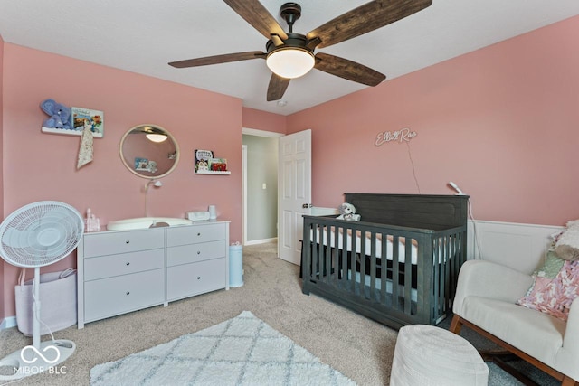 5363 Citadel Dr, Noblesville, IN 46062 - carpeted bedroom with a crib, ceiling fan, and baseboards