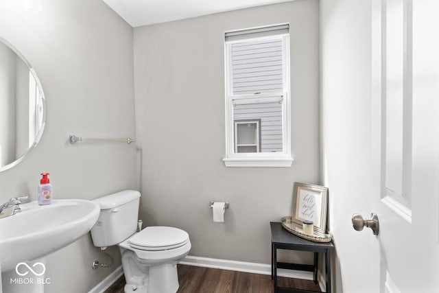 5363 Citadel Dr, Noblesville, IN 46062 - bathroom with toilet, wood finished floors, baseboards, and a sink