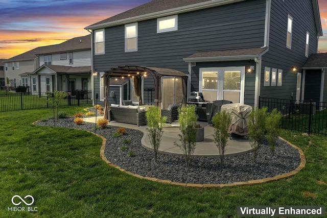 5363 Citadel Dr, Noblesville, IN 46062 - back of property at dusk featuring an outdoor hangout area, a patio area, and a pergola