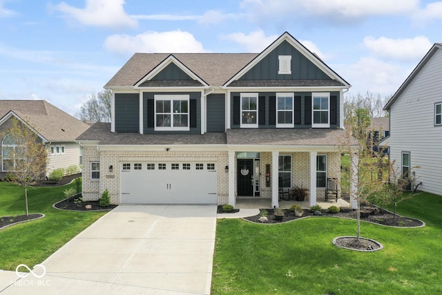 5363 Citadel Dr, Noblesville, IN 46062 - craftsman-style home featuring board and batten siding, brick siding, driveway, and a front lawn