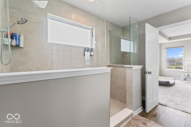 5363 Citadel Dr, Noblesville, IN 46062 - bathroom with walk in shower and wood finished floors