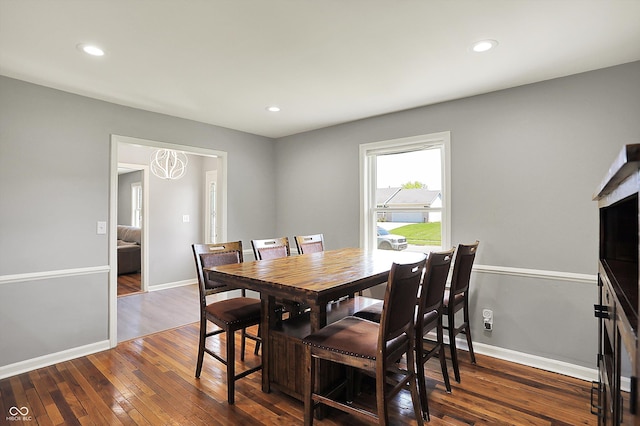 dining room featuring recessed lighting, baseboards, and dark wood-style floors