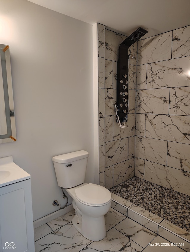 804 S Albany St, Selma, IN 47383 - full bathroom with toilet, a tile shower, marble finish floor, and vanity