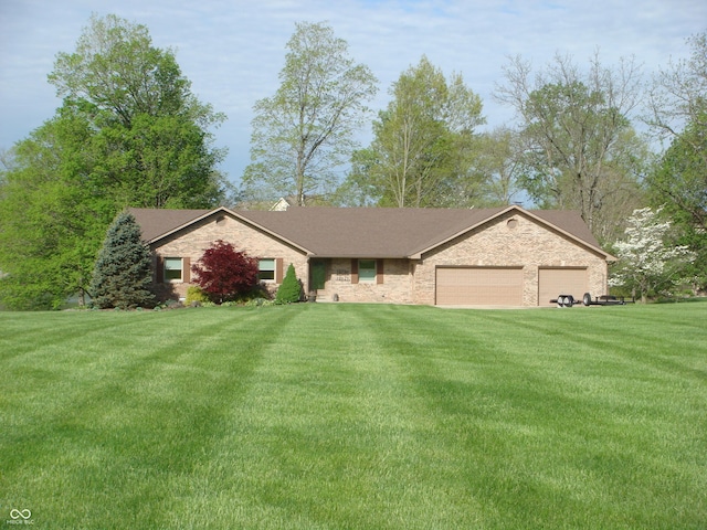 ranch-style house with a front lawn, stone siding, and a garage