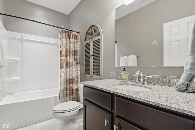 bathroom featuring toilet, visible vents, shower / bath combo, and vanity