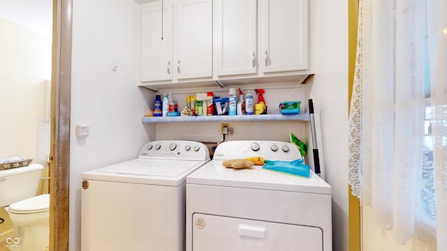 washroom featuring washer and dryer