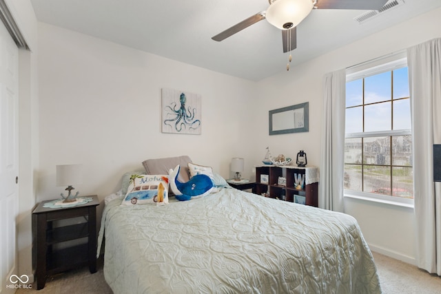 5845 Cresswell Ln, Whitestown, IN 46075 - carpeted bedroom with multiple windows, baseboards, and ceiling fan