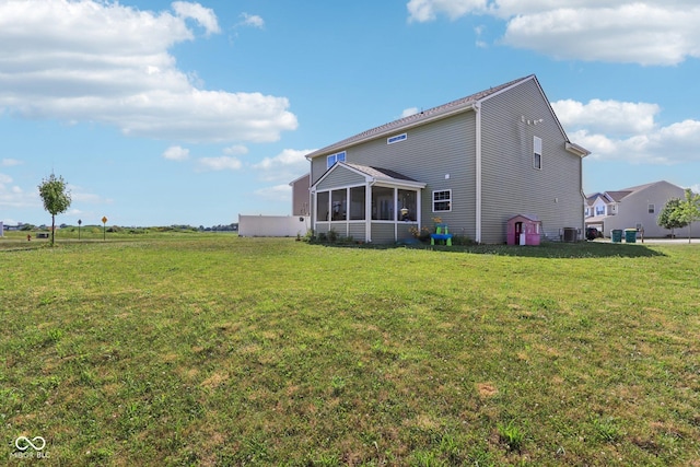 5845 Cresswell Ln, Whitestown, IN 46075 - rear view of property with a sunroom and a yard