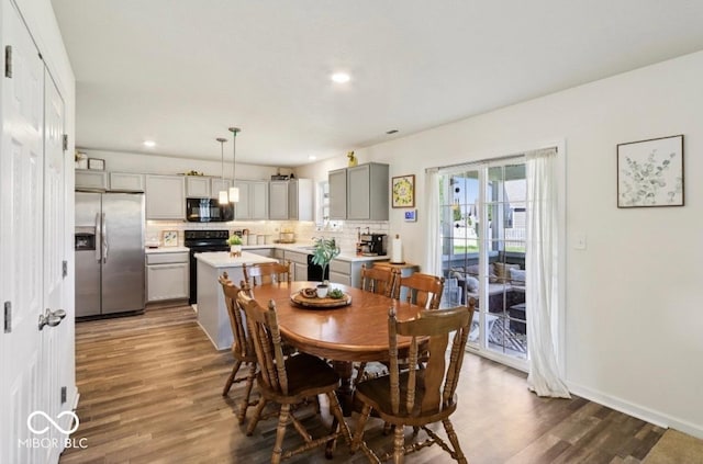 5845 Cresswell Ln, Whitestown, IN 46075 - dining room featuring dark wood-type flooring and recessed lighting