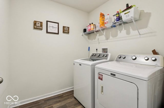 5845 Cresswell Ln, Whitestown, IN 46075 - laundry area featuring washer and dryer and dark wood-type flooring