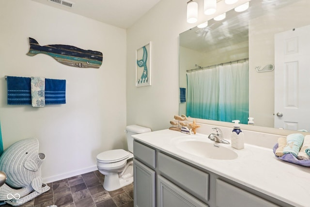5845 Cresswell Ln, Whitestown, IN 46075 - bathroom featuring vanity, stone finish flooring, and a shower with shower curtain