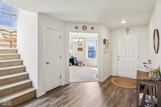 5845 Cresswell Ln, Whitestown, IN 46075 - entrance foyer featuring wood finished floors, a chandelier, recessed lighting, and stairs