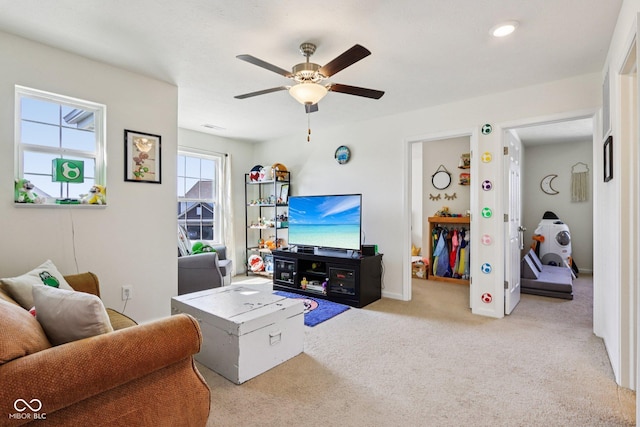 5845 Cresswell Ln, Whitestown, IN 46075 - living area with ceiling fan and carpet floors