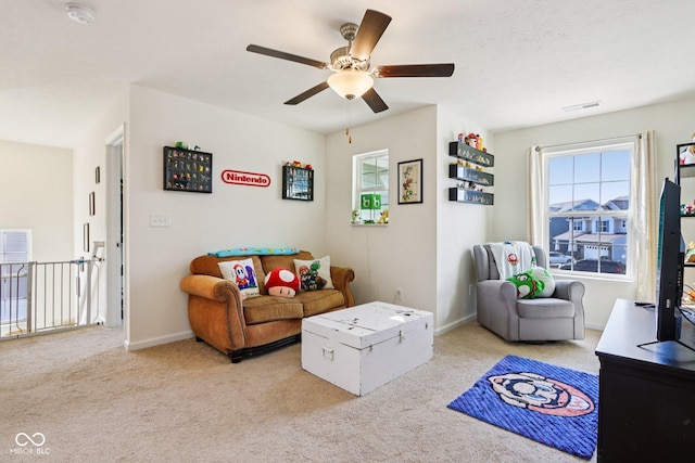 5845 Cresswell Ln, Whitestown, IN 46075 - carpeted living area with ceiling fan and baseboards