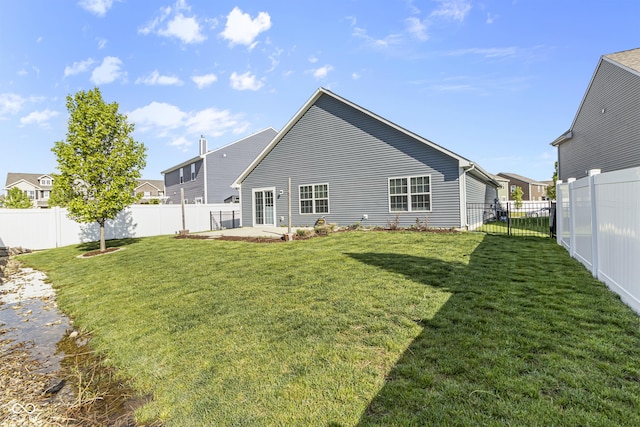 5465 Tanglewood Ln, Whitestown, IN 46075 - rear view of house with a fenced backyard, a yard, and a patio area