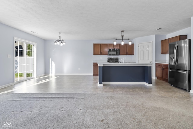 5465 Tanglewood Ln, Whitestown, IN 46075 - kitchen with black microwave, baseboards, stove, a chandelier, and stainless steel fridge with ice dispenser