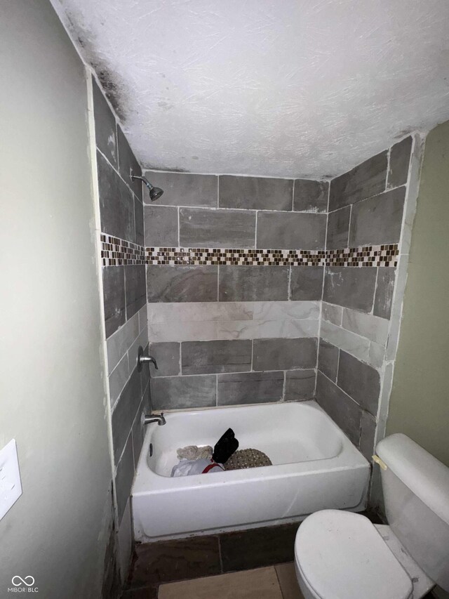 full bath with  shower combination and toilet
